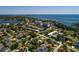 Scenic aerial shot of a coastal neighborhood with waterfront properties and stunning views of the bay at 459 Bayview Ne Dr, St Petersburg, FL 33704