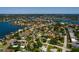 Expansive aerial view of a waterfront neighborhood with lush landscaping, and views of the water at 459 Bayview Ne Dr, St Petersburg, FL 33704
