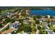 Aerial showcases a lakeside community and tranquil waterways, surrounded by homes at 459 Bayview Ne Dr, St Petersburg, FL 33704