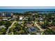 Community aerial view, close to tranquil waters, with condos and single-Gathering homes at 459 Bayview Ne Dr, St Petersburg, FL 33704