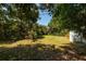 Landscaped backyard features lush foliage creating a private outdoor space at 459 Bayview Ne Dr, St Petersburg, FL 33704