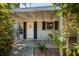 Inviting front porch with decorative chairs and a well-maintained entrance at 459 Bayview Ne Dr, St Petersburg, FL 33704