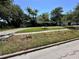 Charming single-story home with mature trees and a circular driveway at 459 Bayview Ne Dr, St Petersburg, FL 33704