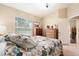 Relax in this bedroom with neutral walls, plush carpet, and natural light coming through the window at 4656 Copper Hill Dr, Spring Hill, FL 34609