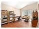 Cozy home office with wood floors, natural lighting, perfect for working from home at 4656 Copper Hill Dr, Spring Hill, FL 34609