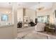 Open living room features high ceilings, neutral colors, and seamless transition to other spaces at 4656 Copper Hill Dr, Spring Hill, FL 34609