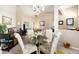 Open-concept living showcasing seamless integration of dining and living areas at 4656 Copper Hill Dr, Spring Hill, FL 34609