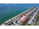 Aerial shot of waterfront condos featuring boat docks and easy ocean access at 4799 Coquina Key Se Dr, St Petersburg, FL 33705