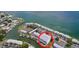 Aerial view of waterfront condos with docks and canal access to the ocean at 4799 Coquina Key Se Dr, St Petersburg, FL 33705