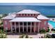 Stunning waterfront building with a metal roof, pool, and beautiful ocean view at 4799 Coquina Key Se Dr, St Petersburg, FL 33705