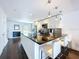 Open concept kitchen with a spacious island and barstool seating at 4799 Coquina Key Se Dr, St Petersburg, FL 33705
