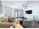Cozy living room with a neutral color palette and plenty of natural light at 4799 Coquina Key Se Dr, St Petersburg, FL 33705