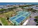 Aerial view of multiple pickleball courts for outdoor recreational activities at 4799 Coquina Key Se Dr, St Petersburg, FL 33705