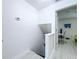 Second story stairwell with a view of the office space at 4799 Coquina Key Se Dr, St Petersburg, FL 33705