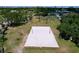 Aerial view of a sand volleyball court ready for recreational fun at 4799 Coquina Key Se Dr, St Petersburg, FL 33705