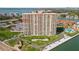 High rise condo community with palm tree lined walkways and bay views at 4900 Brittany S Dr # 1414, St Petersburg, FL 33715
