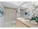 Charming bathroom featuring decorative shower curtain, ample counter space, and elegant finishes at 4900 Brittany S Dr # 1414, St Petersburg, FL 33715