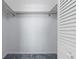 Walk-in closet featuring ample shelving for optimal storage and organization at 4900 Brittany S Dr # 1414, St Petersburg, FL 33715