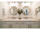 Bathroom features double sinks, modern mirrors, and sleek fixtures at 5597 Bay Tide Ct, Land O Lakes, FL 34638