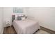 Cozy bedroom showcases a comfortable bed, stylish decor, plush pillows, and an abundance of natural light at 5597 Bay Tide Ct, Land O Lakes, FL 34638