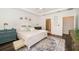 Comfortable main bedroom with a tray ceiling, stylish decor, and lots of natural light at 5597 Bay Tide Ct, Land O Lakes, FL 34638