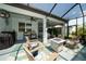 Inviting outdoor space with a stylish fire pit, comfortable seating, and a grill for summer barbecues at 5597 Bay Tide Ct, Land O Lakes, FL 34638