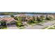An aerial view of suburban homes surrounding a body of water at 5656 Cloverleaf Run, Bradenton, FL 34211