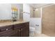 Beautiful bathroom with granite countertop vanity, glass shower and modern fixtures at 5656 Cloverleaf Run, Bradenton, FL 34211