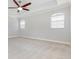 Spacious bedroom with neutral carpet, tray ceiling, two windows and classic trim at 5656 Cloverleaf Run, Bradenton, FL 34211