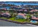 Stunning aerial view of waterfront homes with pools and lush landscaping at 6106 Marbella Blvd, Apollo Beach, FL 33572