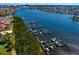 Scenic aerial view of a marina with boats docked on a river at 6106 Marbella Blvd, Apollo Beach, FL 33572