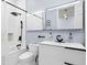 Contemporary bathroom with a modern shower and matte black fixtures at 6106 Marbella Blvd, Apollo Beach, FL 33572