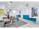 Well-equipped gym features a full mirror and space for various workout machines at 6106 Marbella Blvd, Apollo Beach, FL 33572