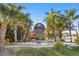 Unique sign for 'Circles' restaurant surrounded by palm trees at 6106 Marbella Blvd, Apollo Beach, FL 33572