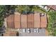 Overhead view of townhomes with parking and back patio; well-maintained roofs and landscaping at 6408 Bonnie Bay N Cir, Pinellas Park, FL 33781
