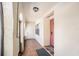 A quaint and charming entryway featuring neutral walls, tile flooring, and natural light that fills the space at 6408 Bonnie Bay N Cir, Pinellas Park, FL 33781