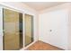 Enclosed sunroom with tile flooring and sliding glass door at 6408 Bonnie Bay N Cir, Pinellas Park, FL 33781