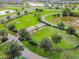 Aerial view of dog park with green spaces, shelters, and walking paths at 6642 Current Dr, Apollo Beach, FL 33572