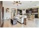 Open-concept living area seamlessly connects the living room and kitchen, great for entertaining and relaxation at 6642 Current Dr, Apollo Beach, FL 33572