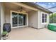Screened patio with hot tub, fan, sliding glass door, and view of a backyard at 6642 Current Dr, Apollo Beach, FL 33572