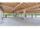 View underneath home on pilings showing supports and ample open space at 7606 Four Pines Rd, Plant City, FL 33565