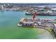 Waterfront condo building with an outdoor pool and bay views at 7645 Sun Island S Dr # 304, South Pasadena, FL 33707