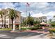 Welcome to Bay Island! Beautiful community entrance featuring lush landscaping and security at 7645 Sun Island S Dr # 304, South Pasadena, FL 33707
