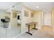 Bright dining area with a mirror accent wall and easy access to the kitchen at 7645 Sun Island S Dr # 304, South Pasadena, FL 33707