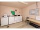 Functional laundry room with multiple washers and dryers, plus folding table at 7645 Sun Island S Dr # 304, South Pasadena, FL 33707