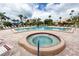 The community pool and hot tub offer a great way to relax and enjoy the outdoors at 7645 Sun Island S Dr # 304, South Pasadena, FL 33707