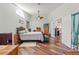 Bedroom featuring vaulted ceiling, ceiling fan, and ensuite bathroom and walk-in closet at 9375 French Quarters Cir, Weeki Wachee, FL 34613