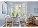 Charming dining area with natural lighting, perfect for cozy meals at 9375 French Quarters Cir, Weeki Wachee, FL 34613