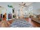 Large living room with fireplace, decor and view of the kitchen and dining areas at 9375 French Quarters Cir, Weeki Wachee, FL 34613