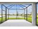 Covered patio featuring a lovely view of the lake at 9530 Coastline Way, Parrish, FL 34219